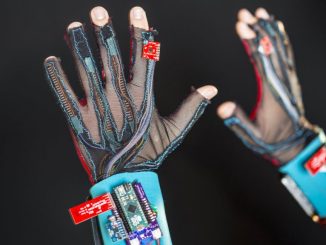 O pereche de mânuși traduc limbajul semnelor